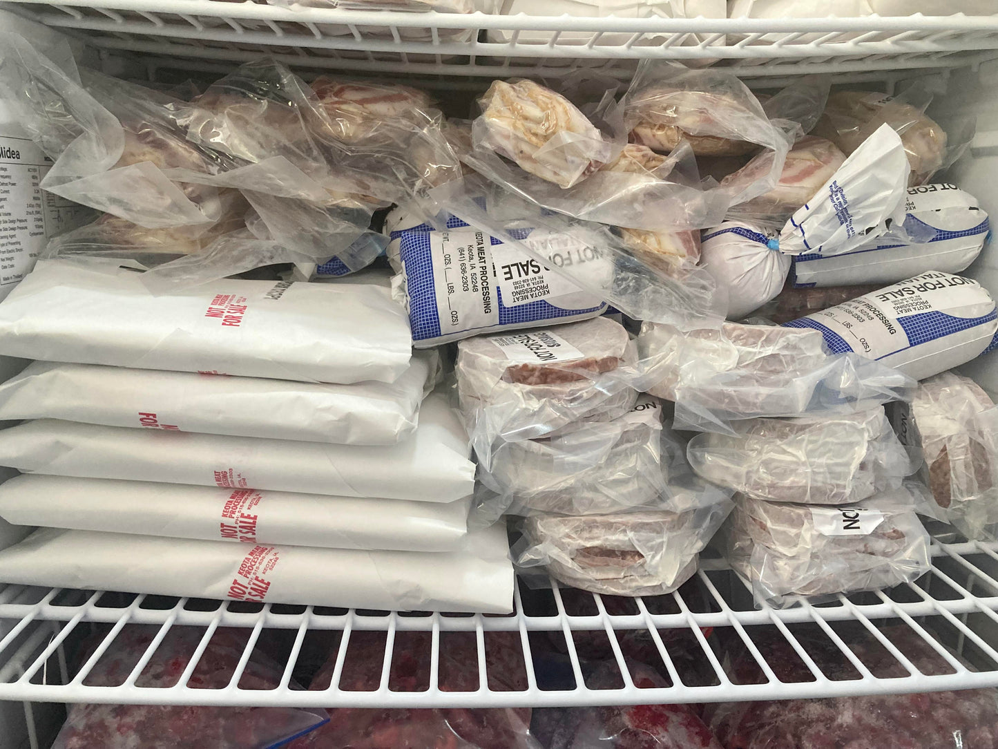 1/2 hog from Keota Locker on freezer shelf