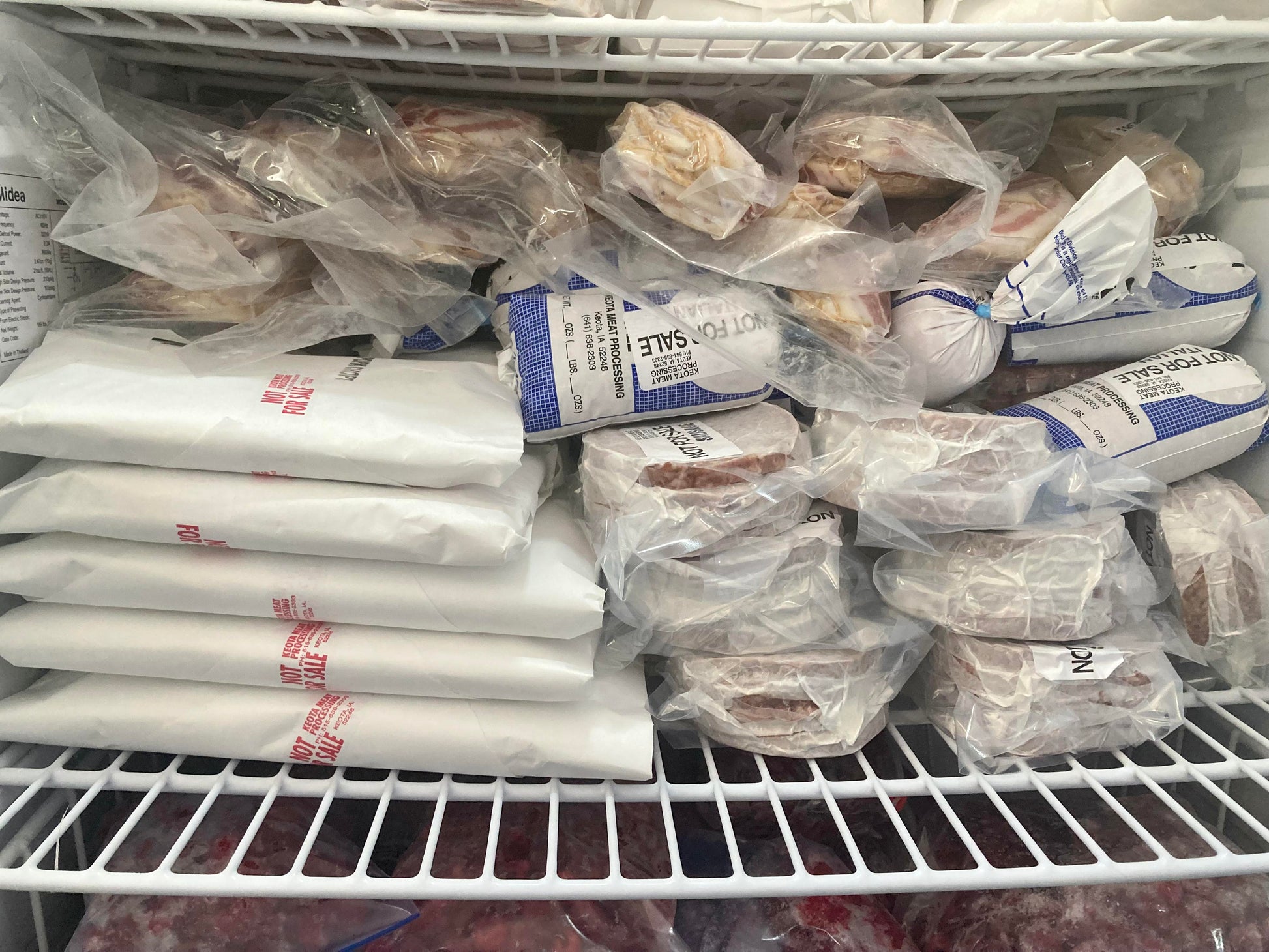 1/2 hog from Keota Locker on freezer shelf